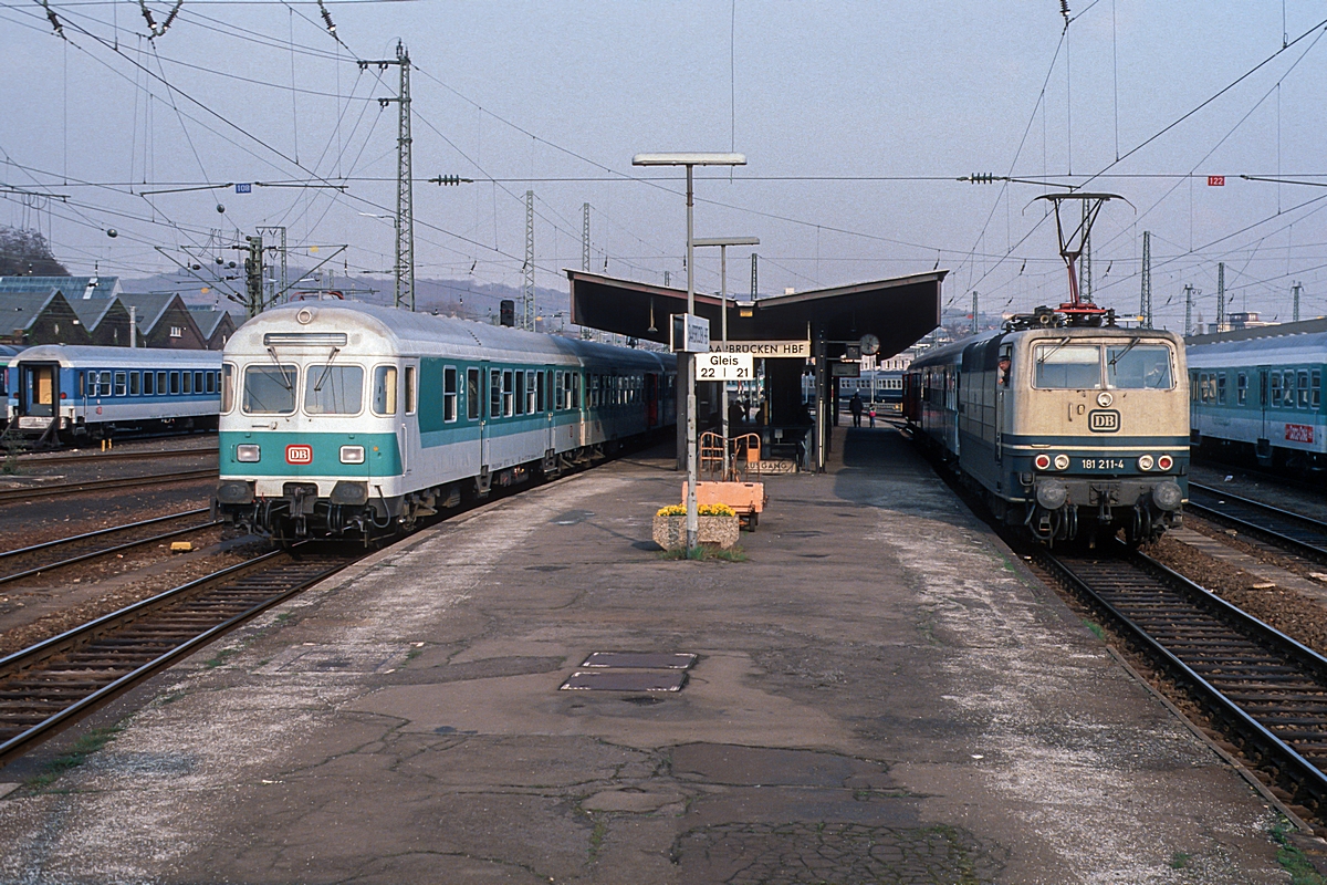  (19910409_55-30_181 211_Saarbrücken Hbf_N 4671_SSH-Wemmetsweiler-SNK_b.jpg)